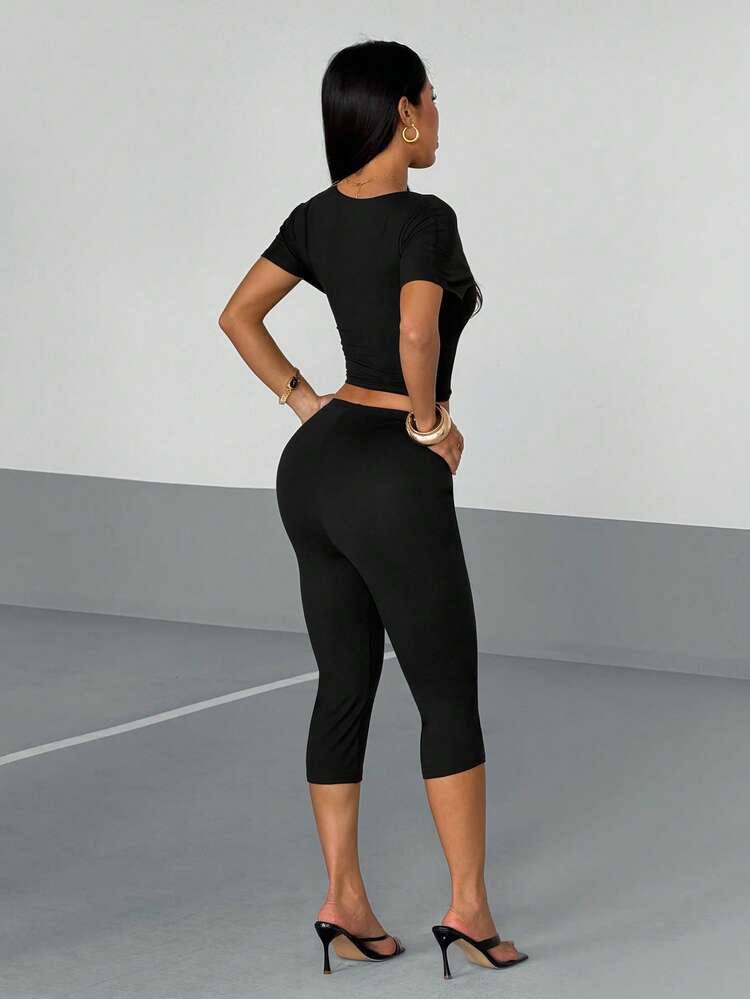 Short sleeve V neck crop top capri length leggings sets