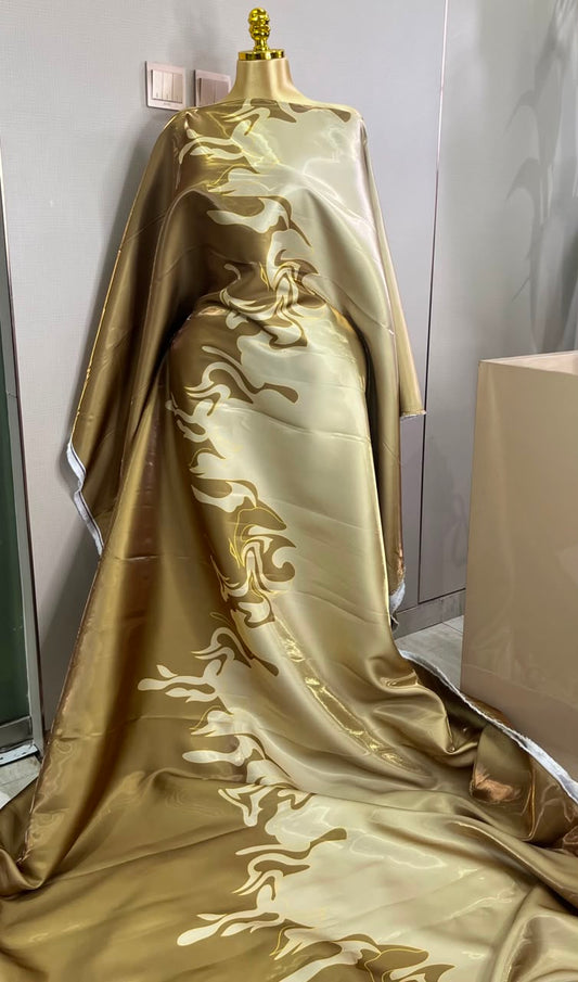 glossy, gold-toned African boubou